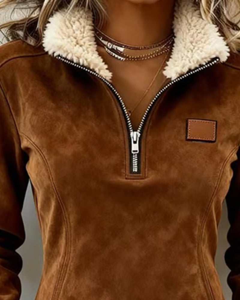 Half-zip collar sweatshirt with an asymmetrical design and fringe accents