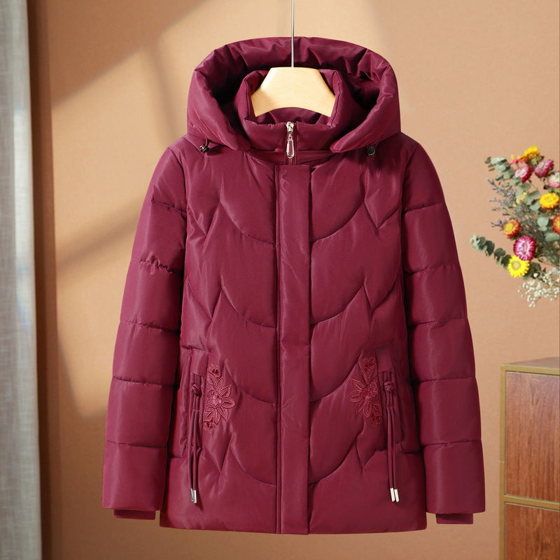 Women's quilted thermal outdoor jacket with a hood and floral embroidery