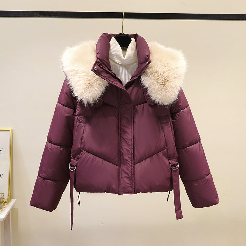 Women’s short quilted jacket with a voluminous faux-fur collar and waist belt