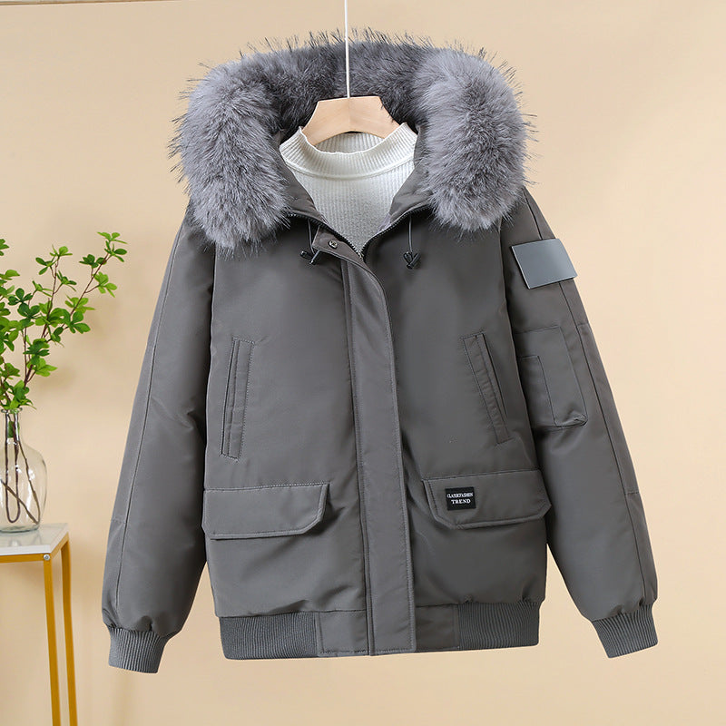 Women's padded bomber jacket with detachable faux-fur hood and ribbed cuffs